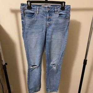 light wash jeans with rip